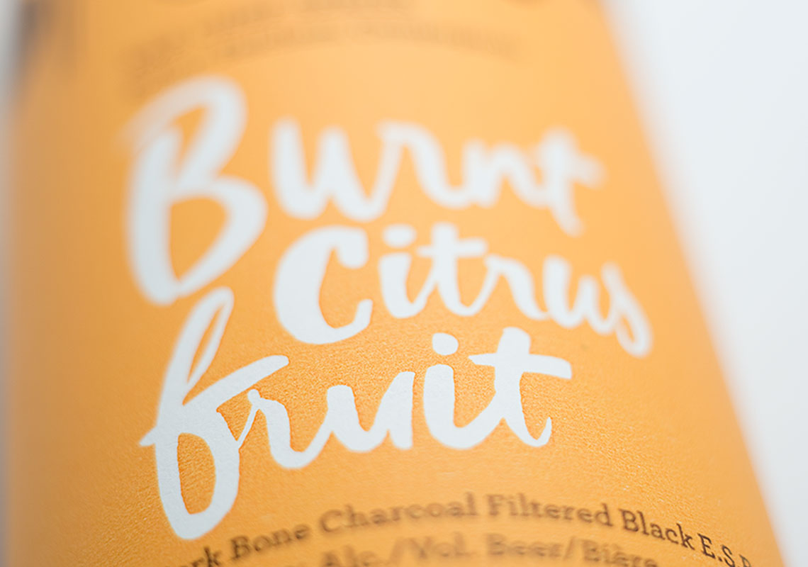 A Close Up of Custom Typography for the Label Design of the Burnt Citus Fruit ESB, Designed for the R&B Brewing Chef Series