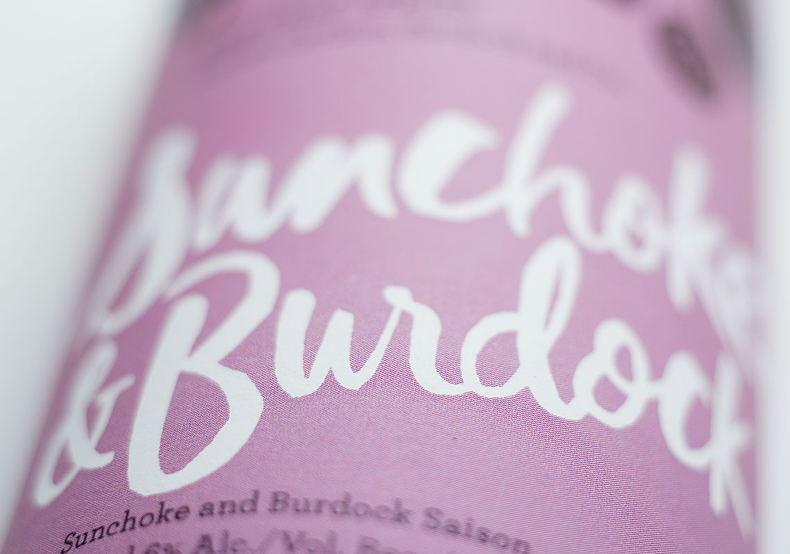 A Close Up Shot of the Typography on the Sunchokes & Burdock Brew, Designed for R&B Brewing's Chef Series