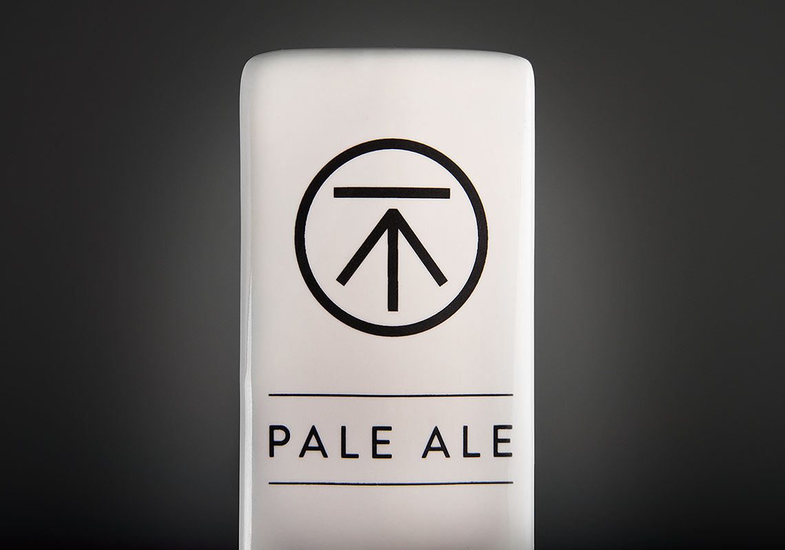 A Close Up of the Benchmark Pale Ale Tap Handle, Created for Famoso Pizzeria and Brewed By Parallel 49